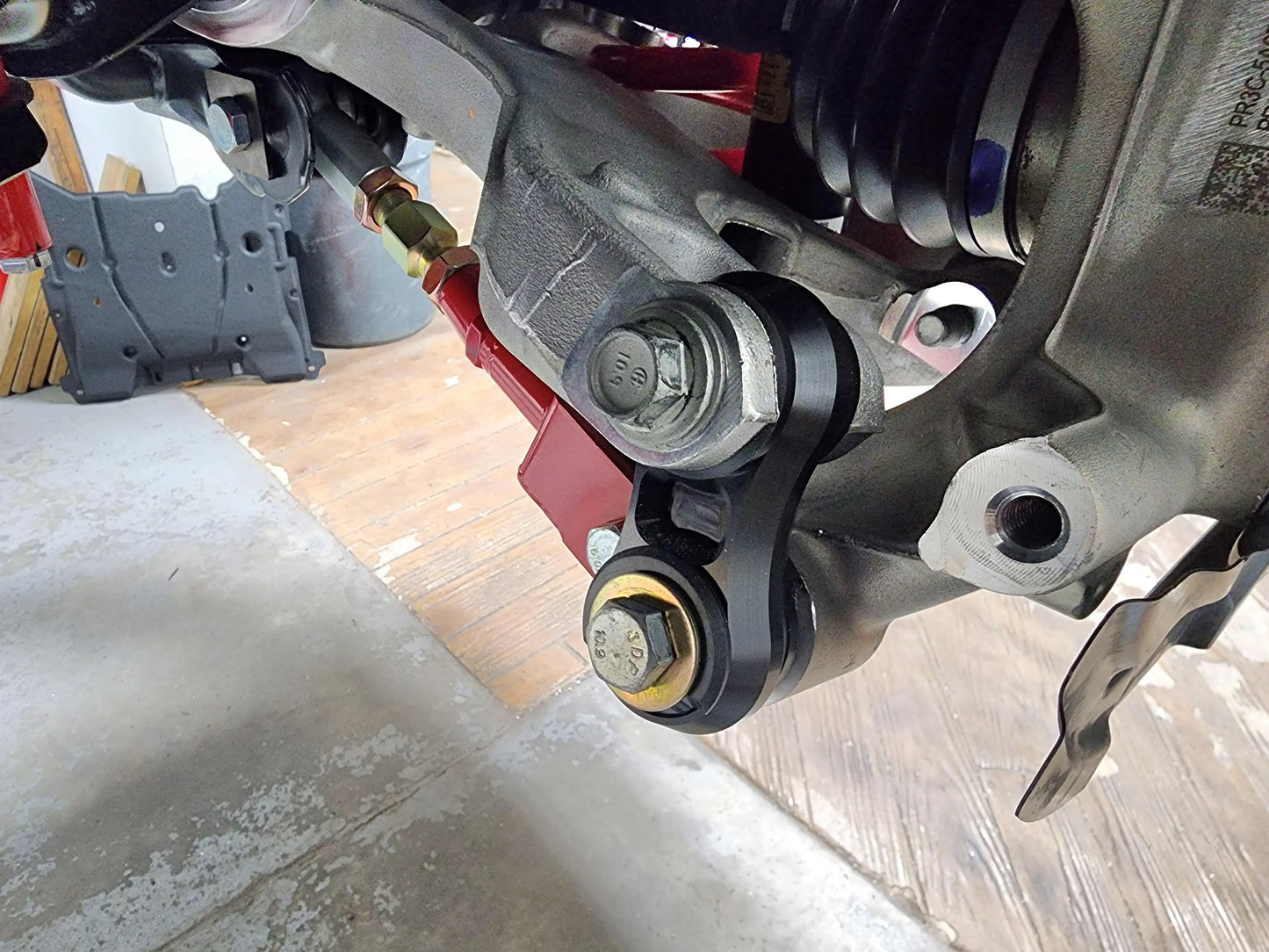 Vertical link, rear lower control arms, delrin bushings